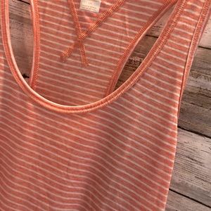 Lucy orange abs shite tank top. Large.